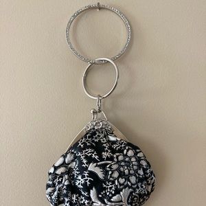 Soprano embossed leather rhinestone bangle wristlet in black and silver.